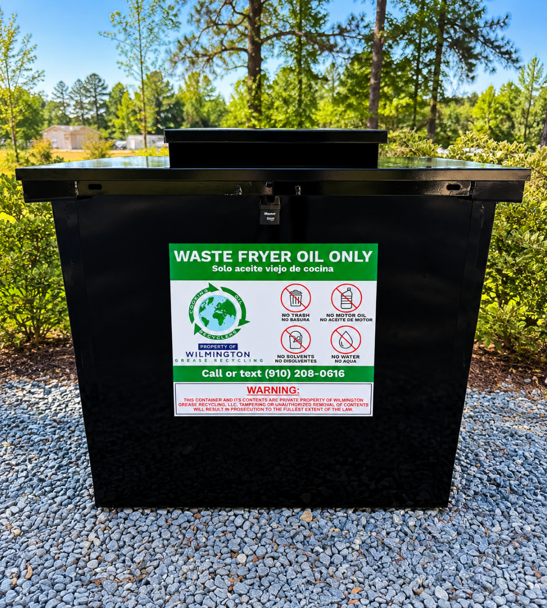 Grease Container & Bin Management 8 Black waste fryer oil recycling container labeled for used cooking oil collection, photographed outdoors on a gravel surface.